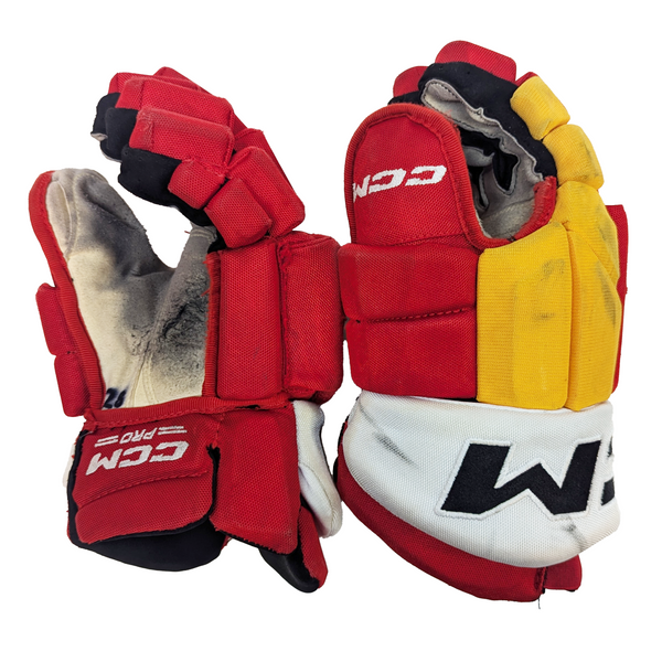 CCM HGTKPP - Used NHL Pro Stock Glove - Calgary Flames (Red/Yellow)