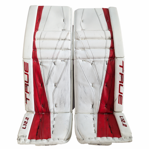 TRUE L12.2 - Used AHL Pro Stock Goalie Pads (White/Red)