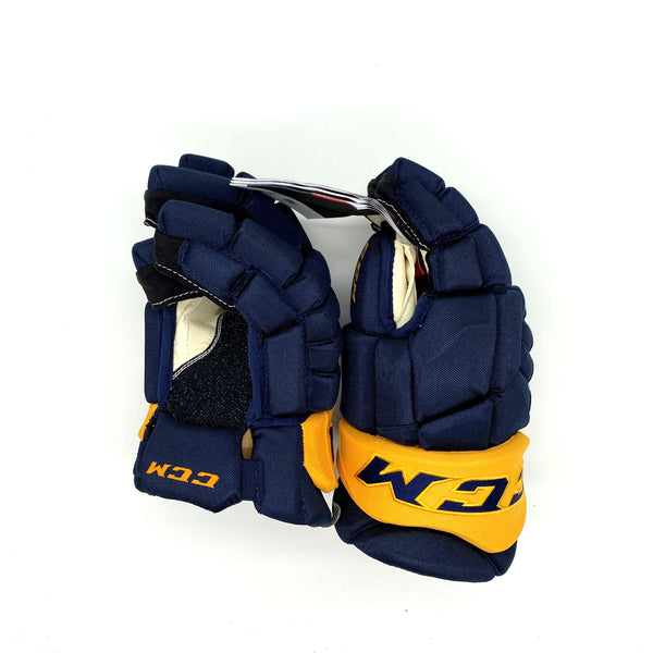 CCM HGPJS - NHL Pro Stock Glove - Rasmus Andersson (Red/Yellow