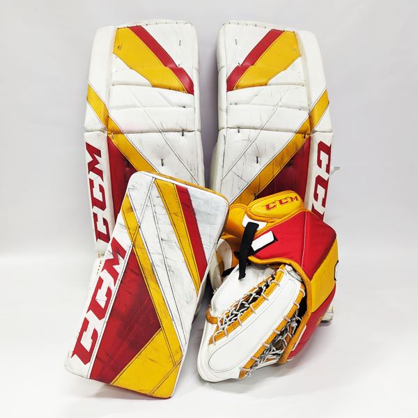 CCM Extreme Flex 5 - Used AHL Pro Stock Goalie Pads (White/Red/Yellow)